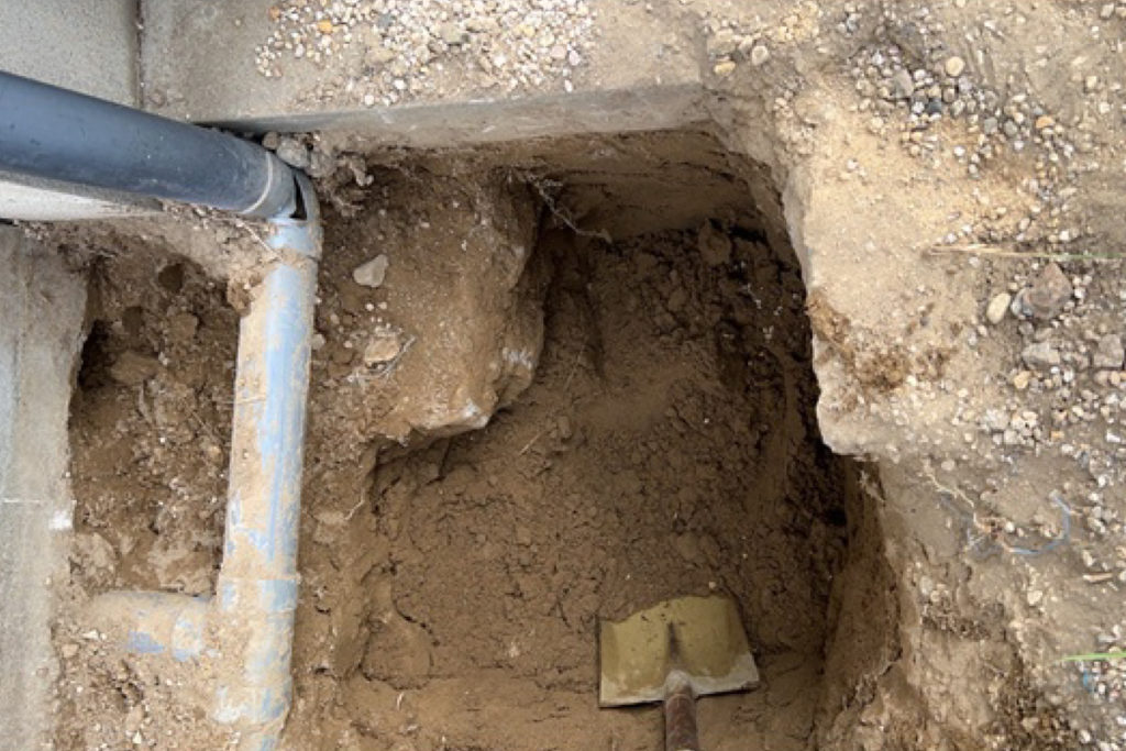 沈下修正工事掘削作業（石川県羽咋市）