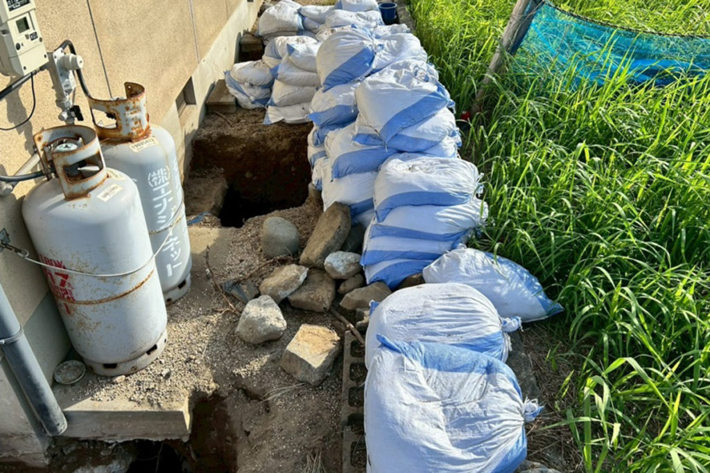 沈下修正工事掘削作業（石川県羽咋市）